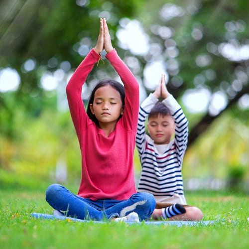 Kids doing yoga