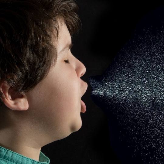 Kid sneezing